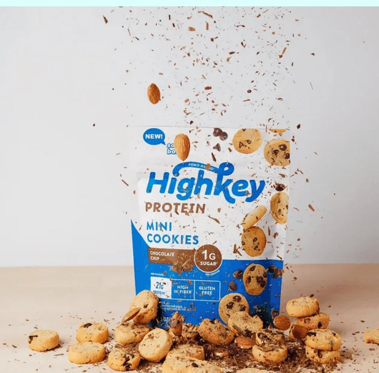HighKey protein mini cookies bag with cookies mid-air